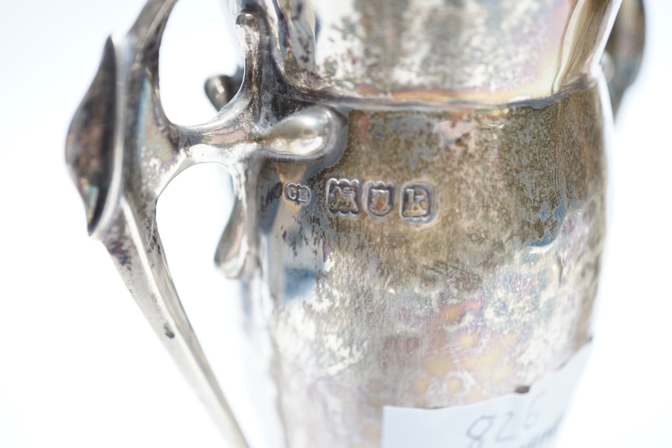 A pair of Edwardian Art Nouveau silver two handled posy vases, Charles Edwards, London, 1905, 16cm, 8oz.